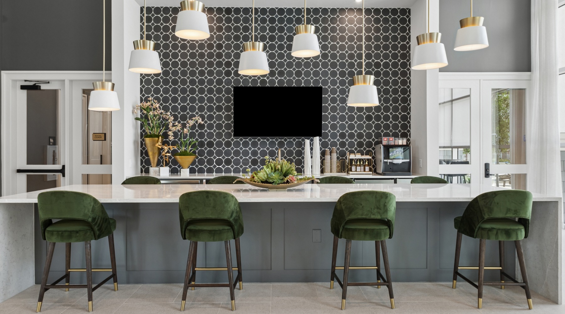 Clubhouse kitchen with barstools and large island