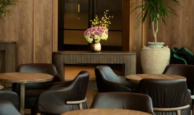 a room with chairs and tables